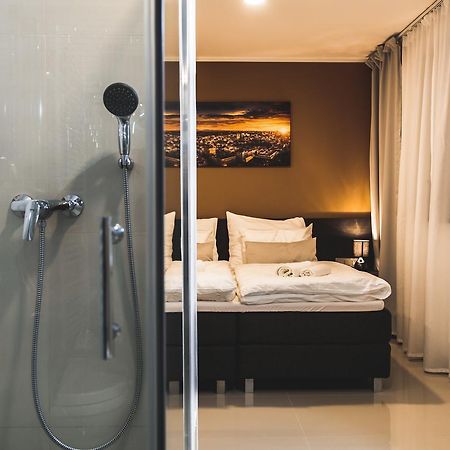Silesia Residence Ostrava Exterior photo A shower in a hotel room