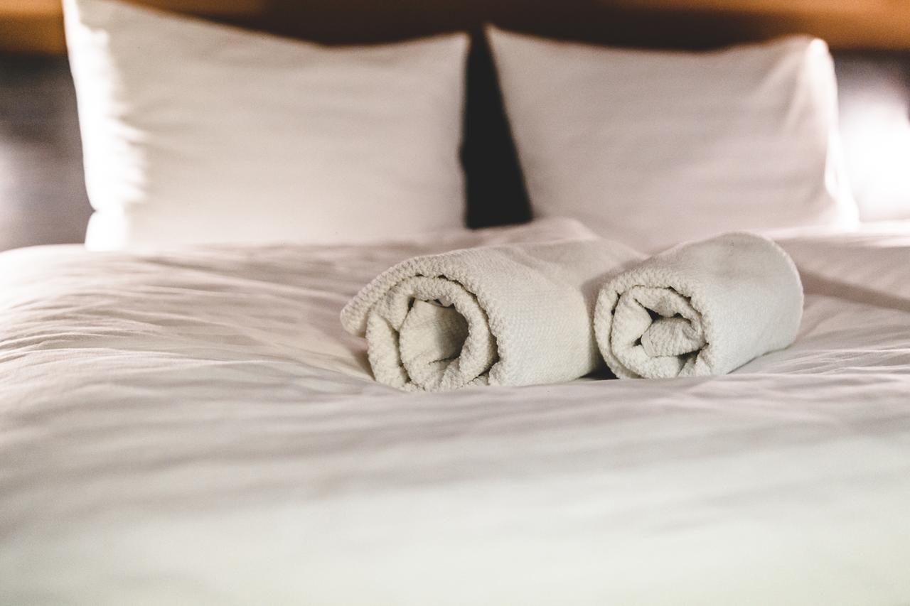 Silesia Residence Ostrava Exterior photo Bath towels on a bed
